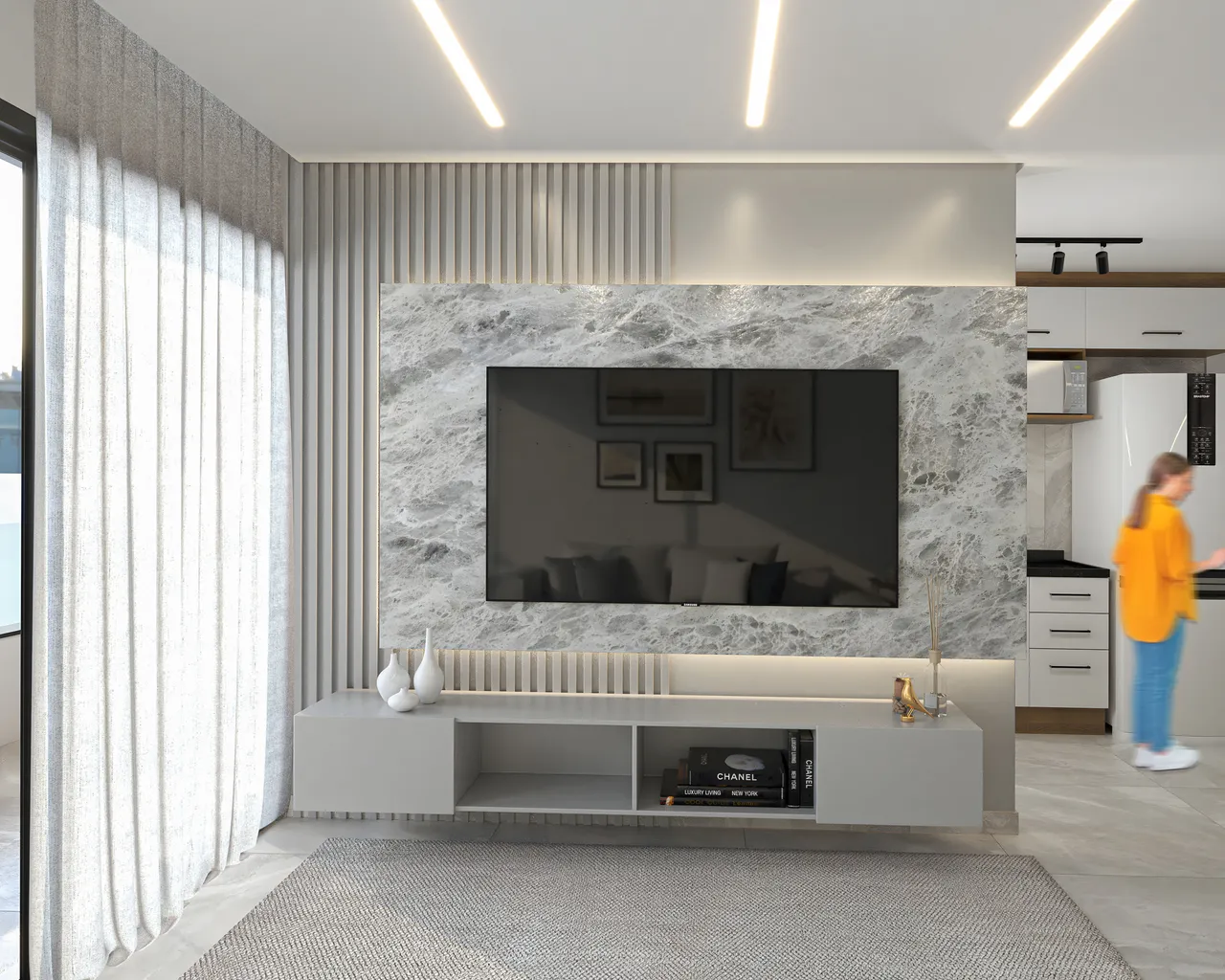 Sala com painel de mármore, marcenaria e iluminação embutida